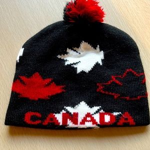 Winter hat for kids with Pom-Pom. Canada hat, size Small. New, never worn.